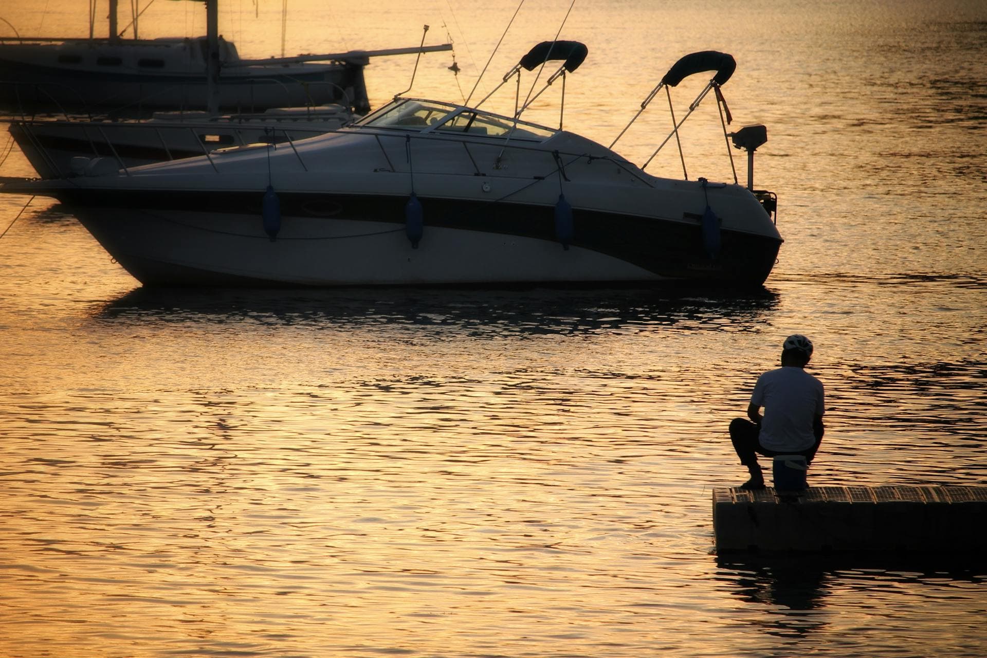 Motor yacht at golden hour — a successful handoff